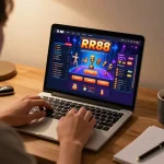 Engaging gameplay on RR88 platform with a player using a laptop for online casino experience.